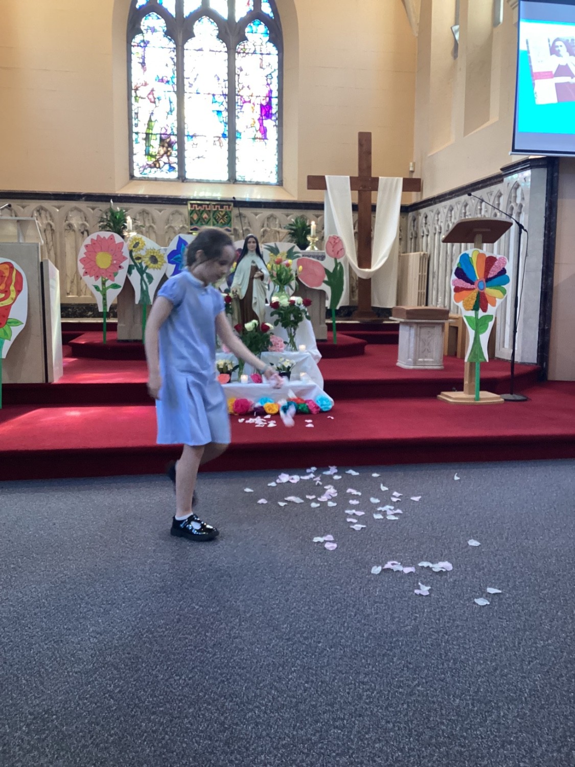 Sprinkling of a ‘rain of roses' honouring St. Therese