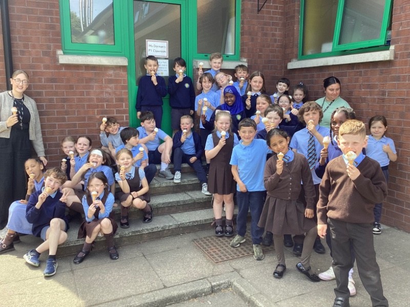 Enjoying ice-cream in the May sunshine.